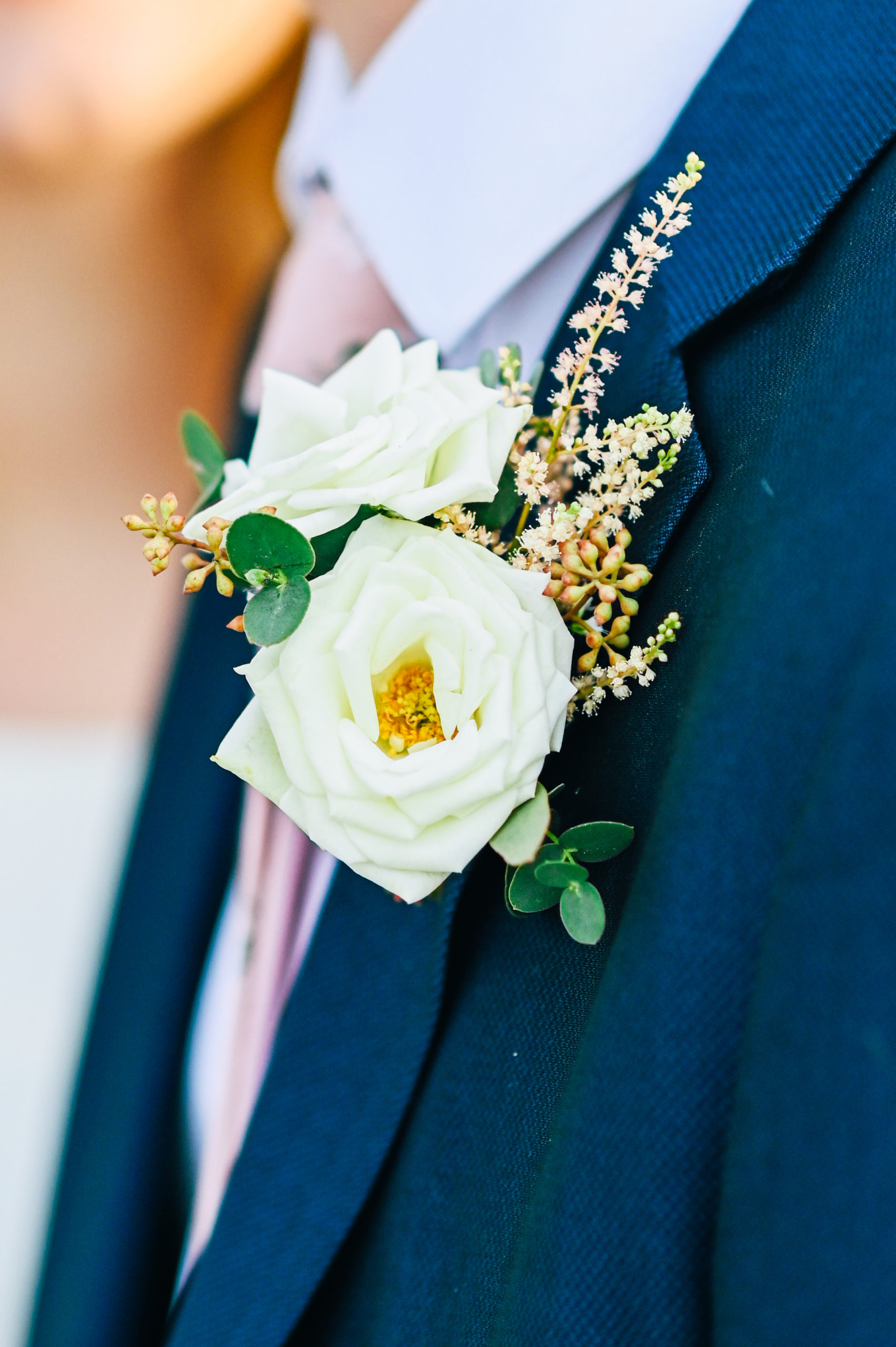 close up of groom's boutonnière