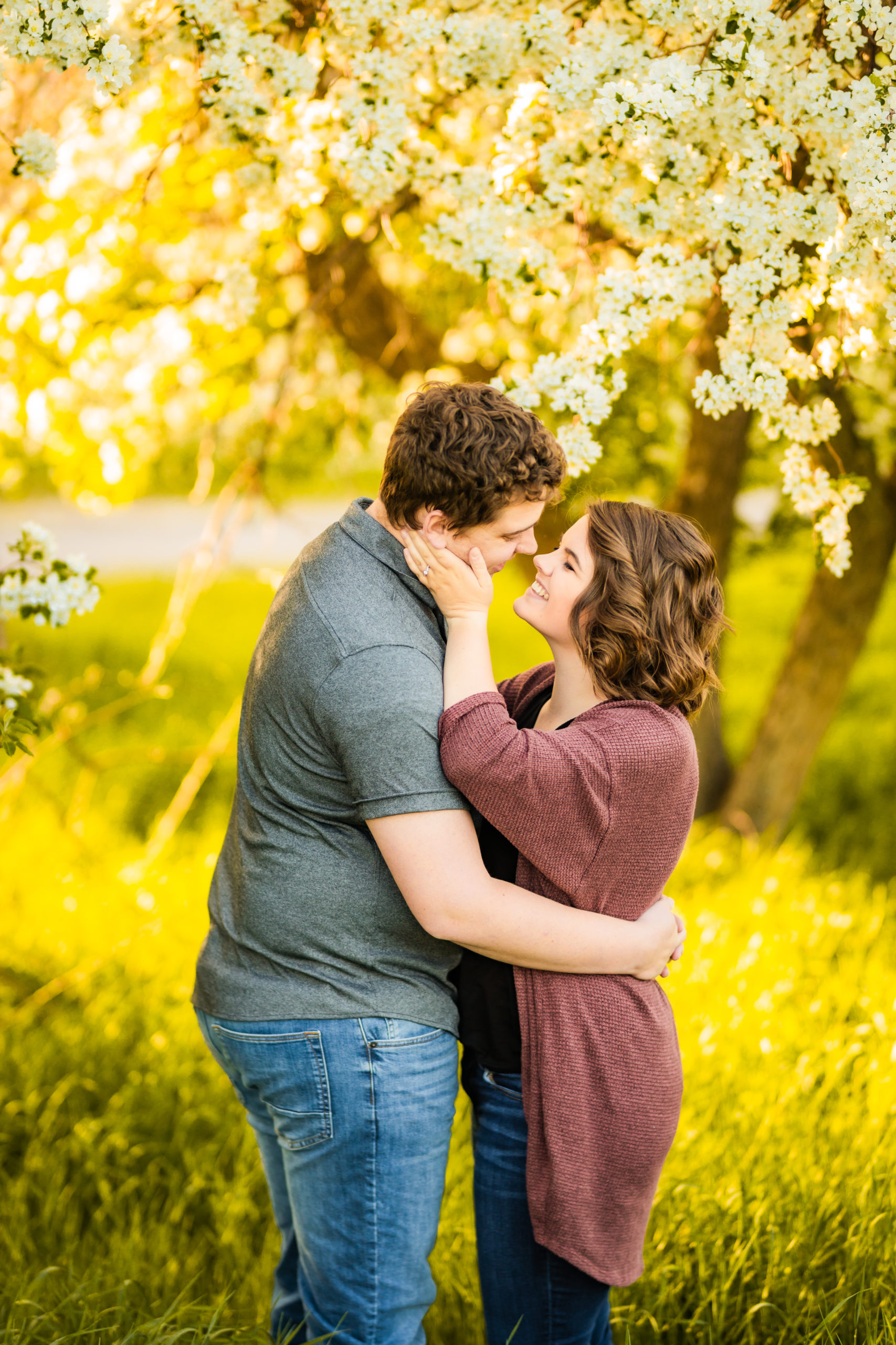 man and woman embracing during outdoor engagement session