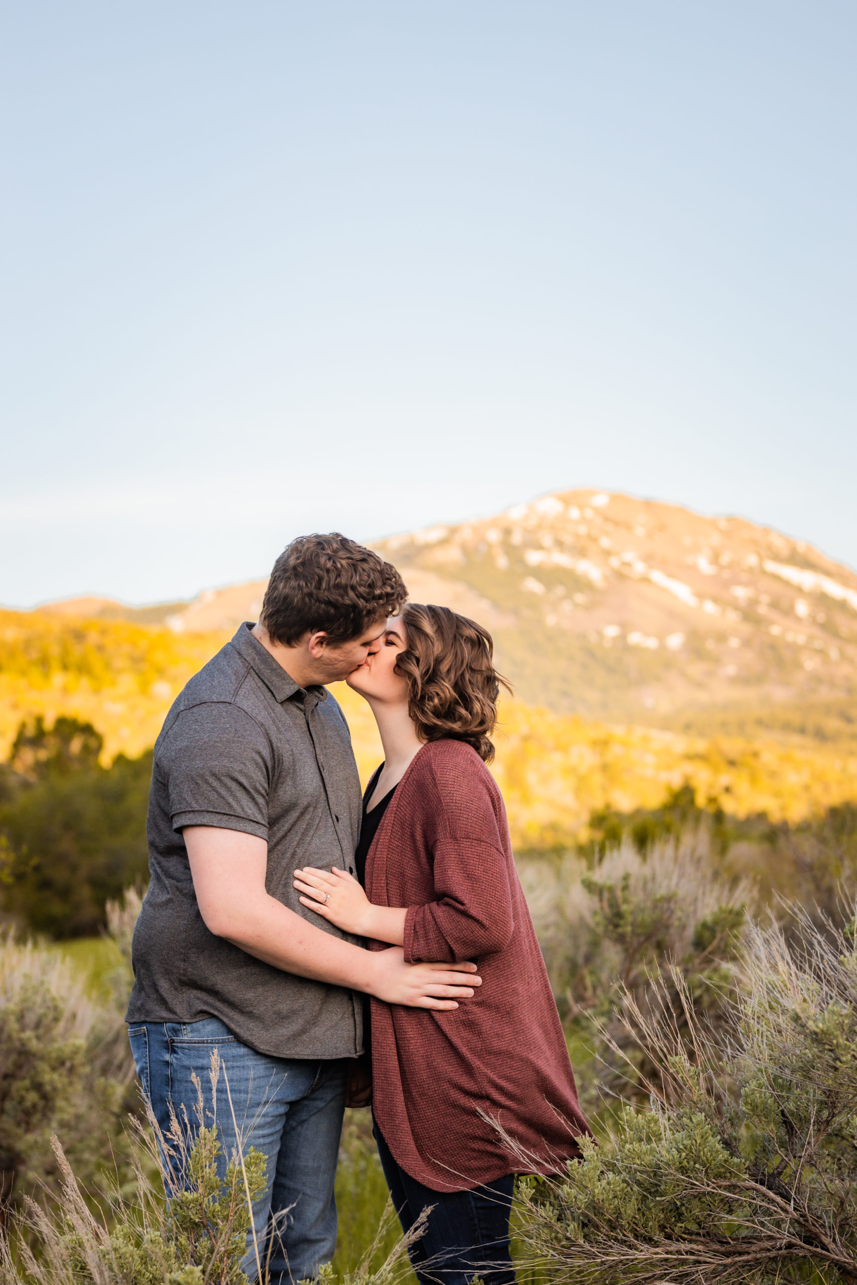 couple kissing during Sunflower Pocatello Engagements