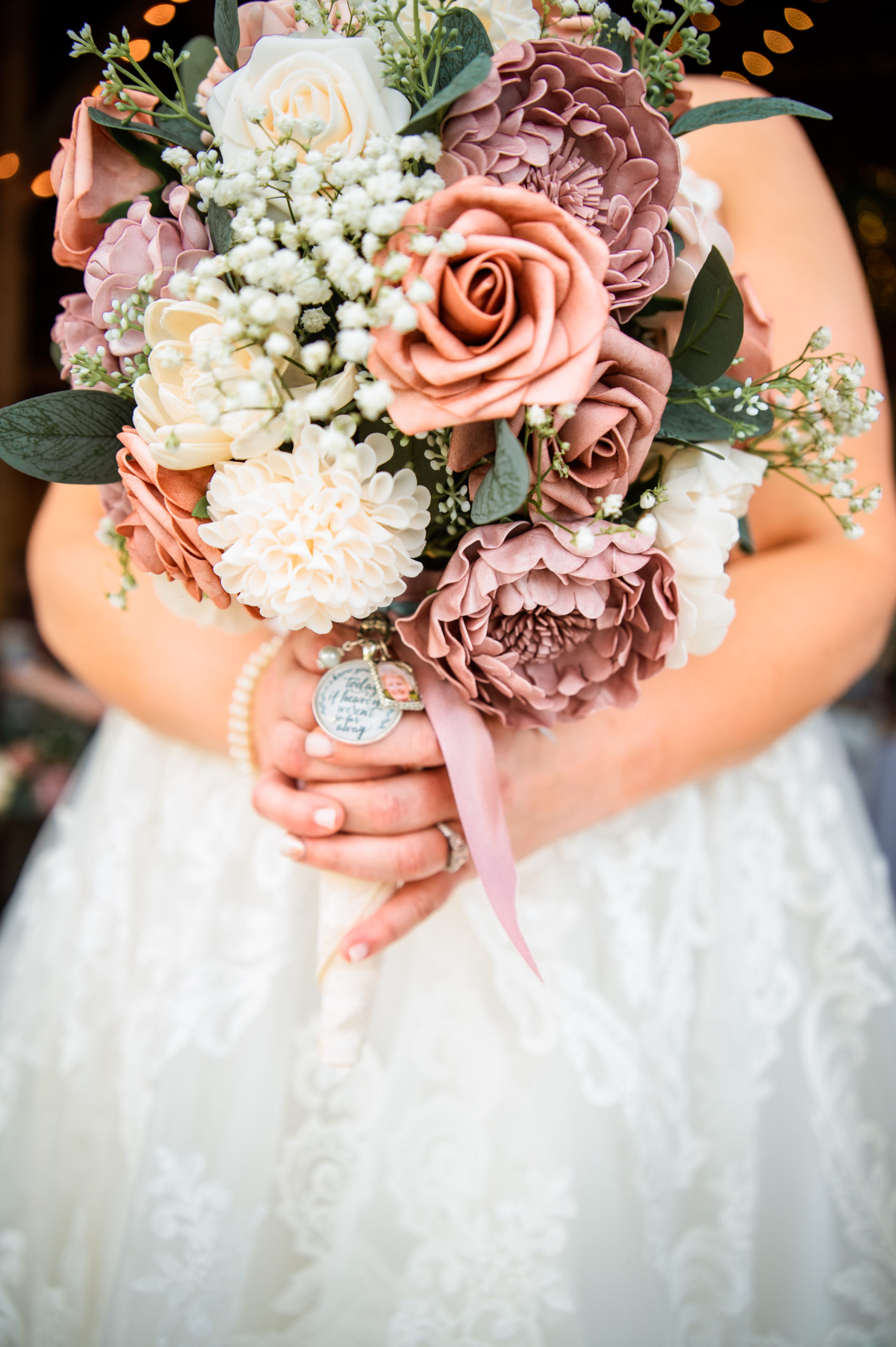 bridal bouquet with blush pink roses and white florals