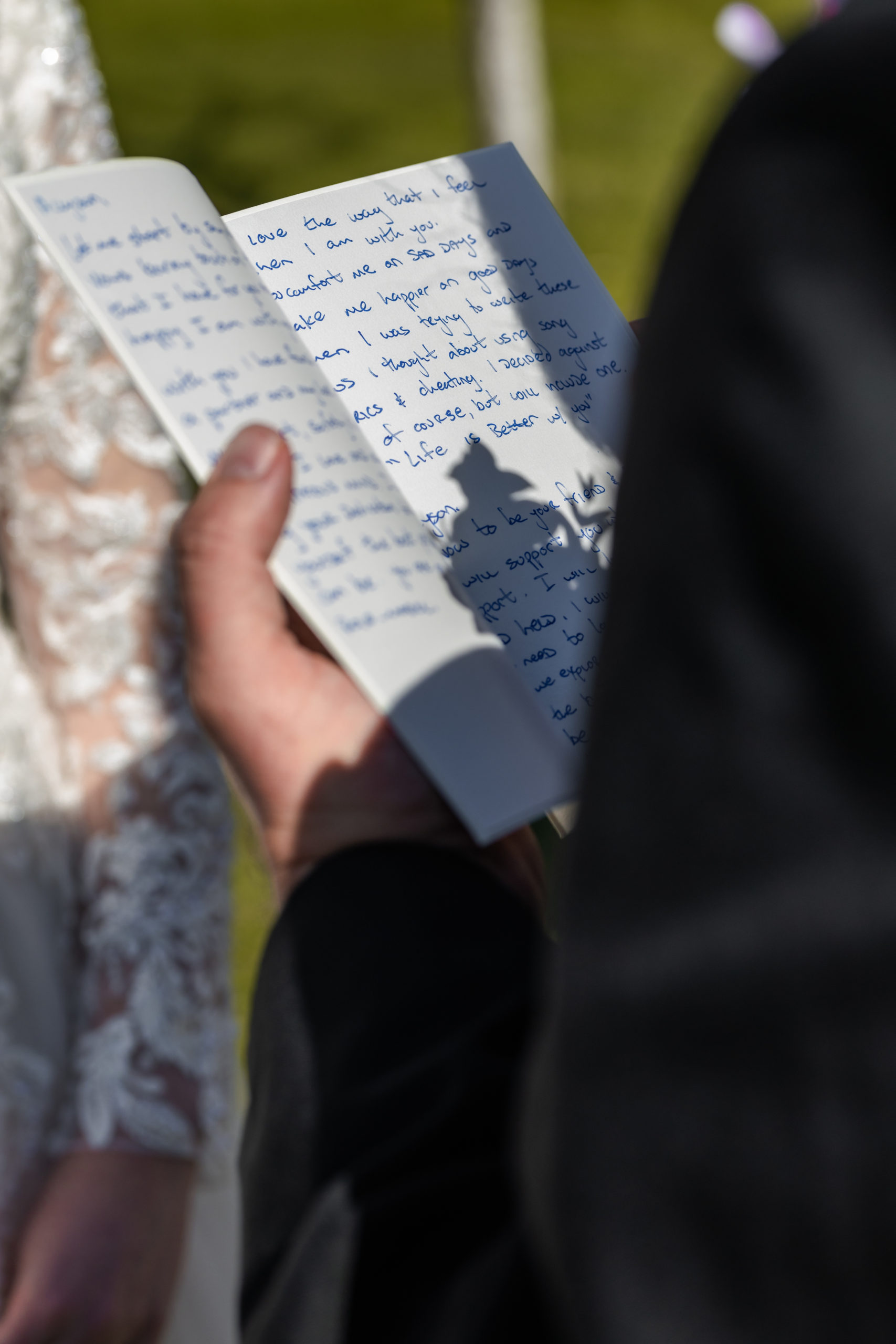 close shot of grooms vows
