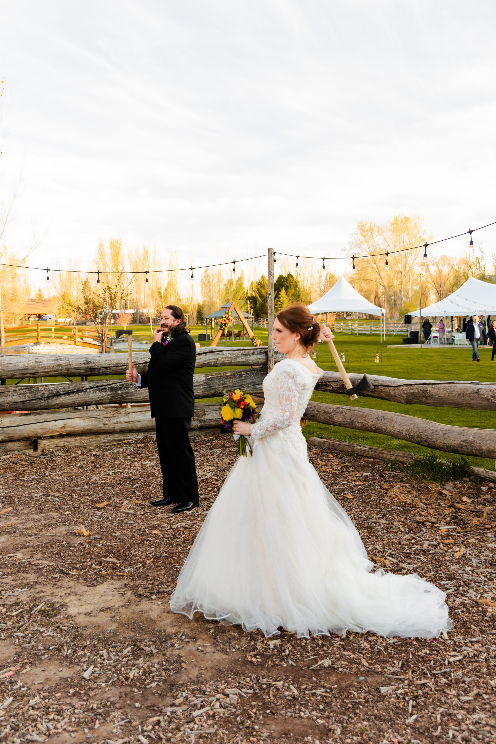 bride and groom playing outdoor games during reception
