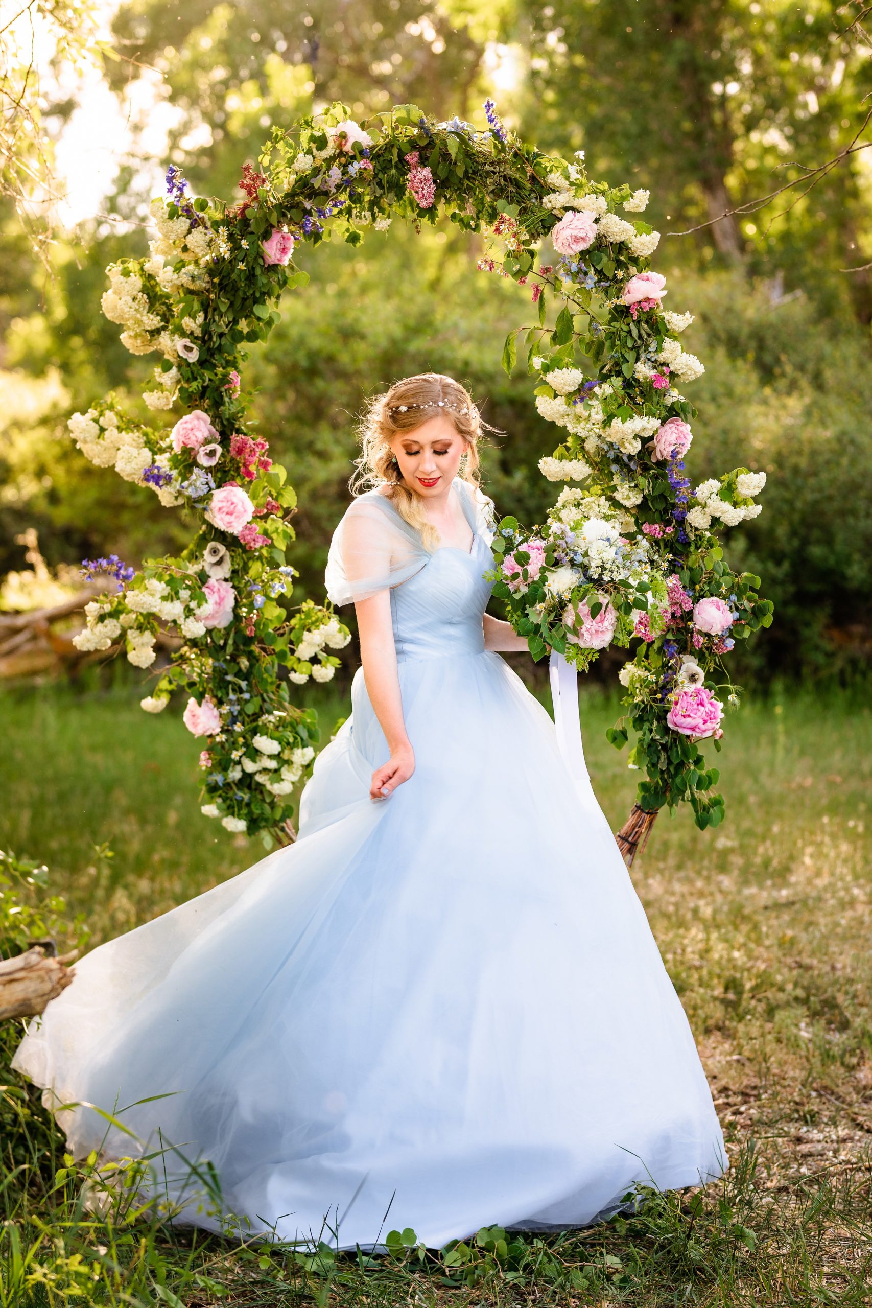 blue wedding dress with beautiful blond bride swishes