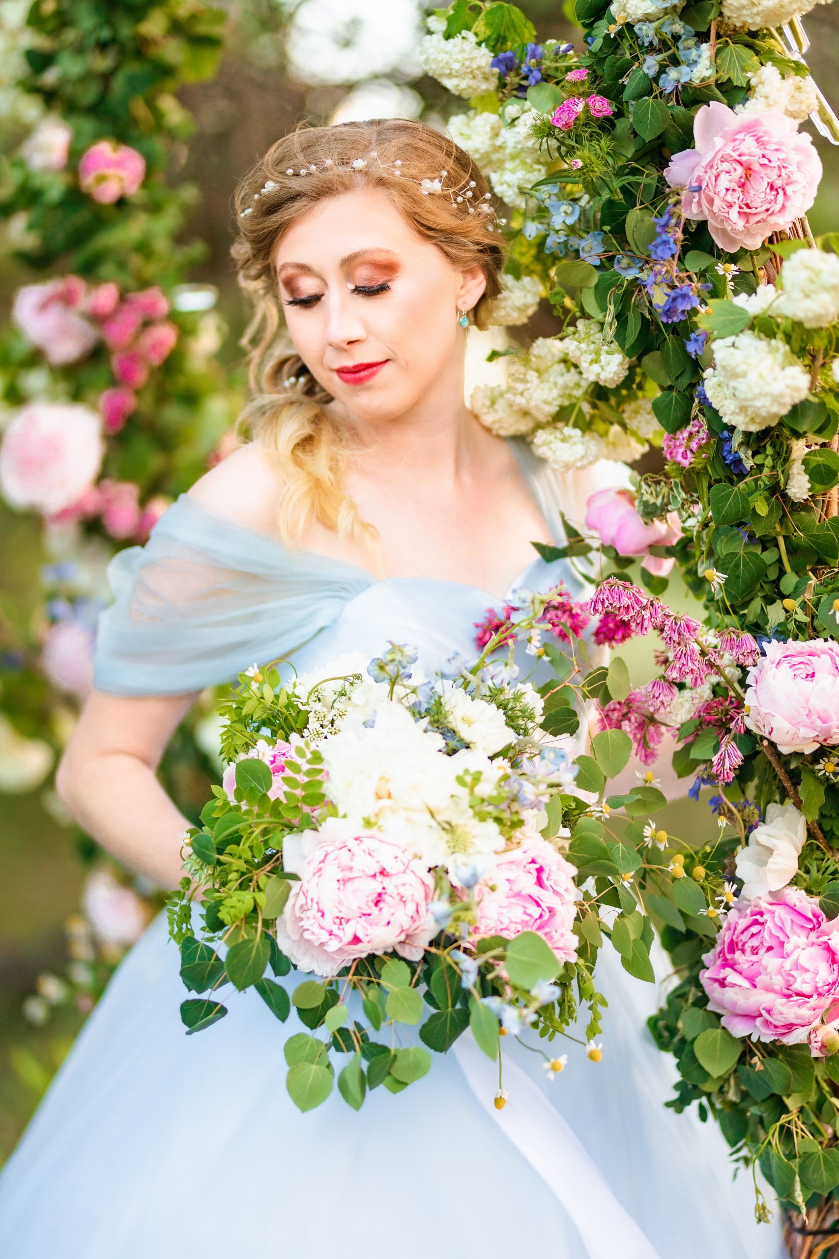bride decorated in pink and deluxe flowers