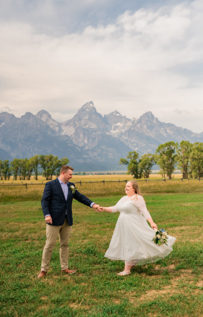 Jackson Hole wedding photographers capture couple dancing in Grand Teton National Park