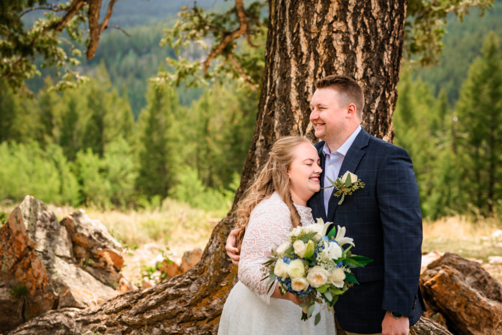 Jackson Hole wedding photographer captures bride and groom laughing after Grand Teton National Park wedding