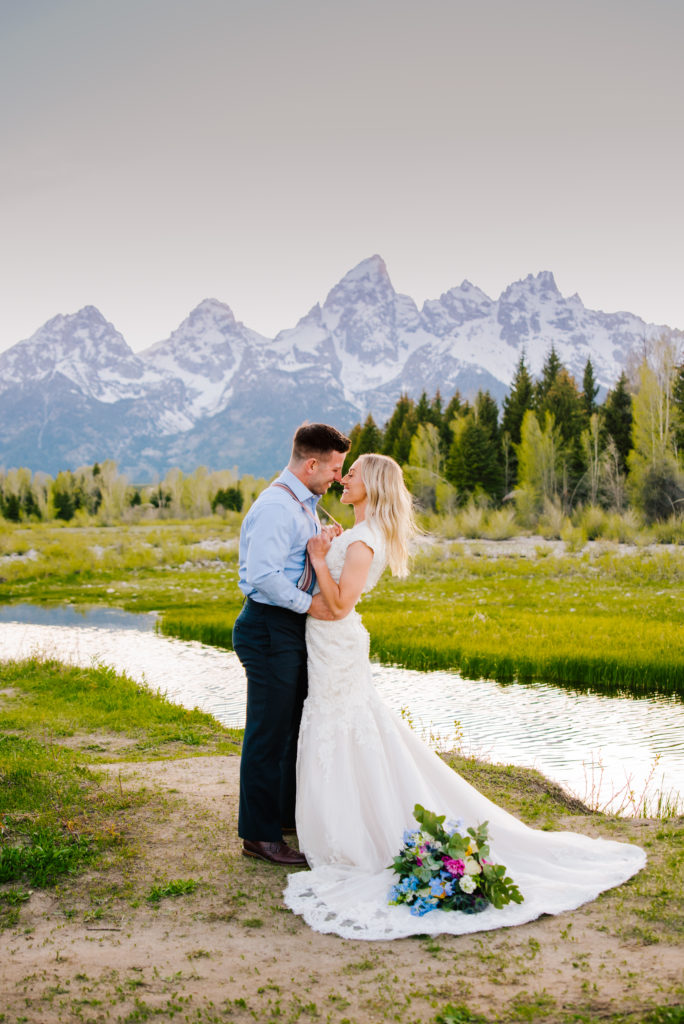 Jackson Hole wedding photographer captures couple kissing as husband and wife