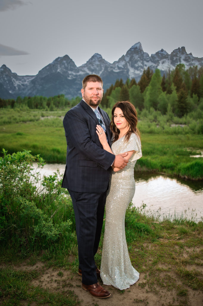 Jackson hole elopement photographer captures bride and groom embracing in Jackson Hole wedding fun