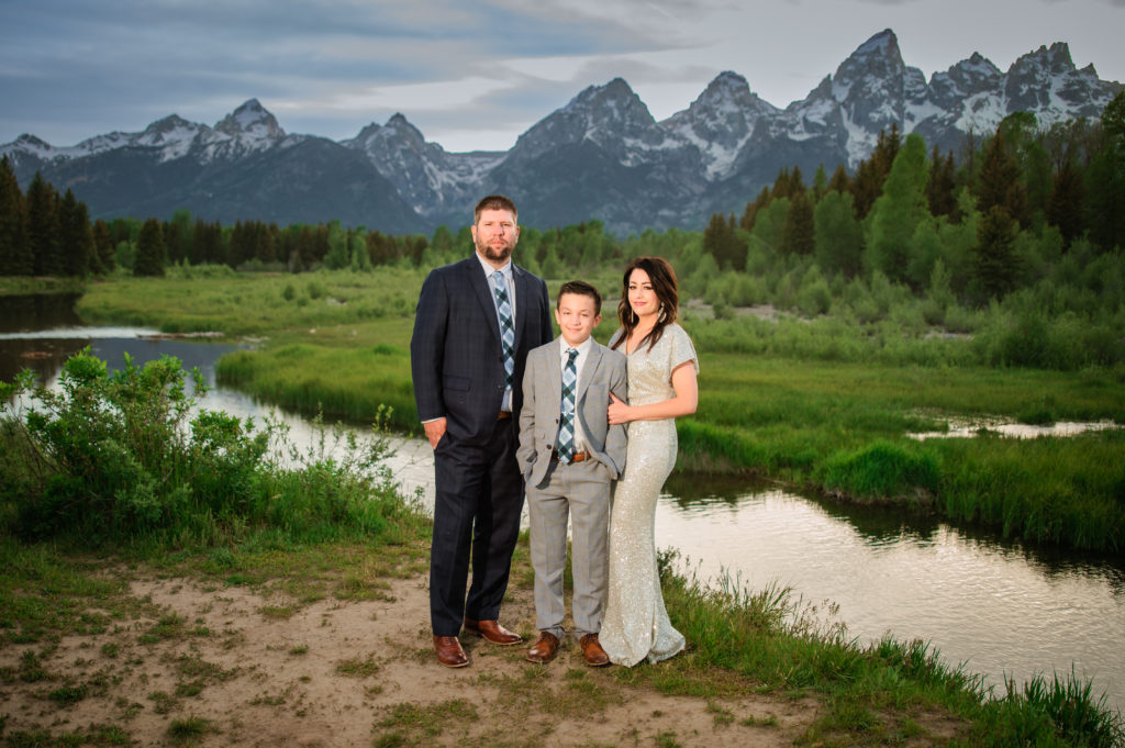 Jackson Hole elopement photographer captures family standing together after jackson hole elopement