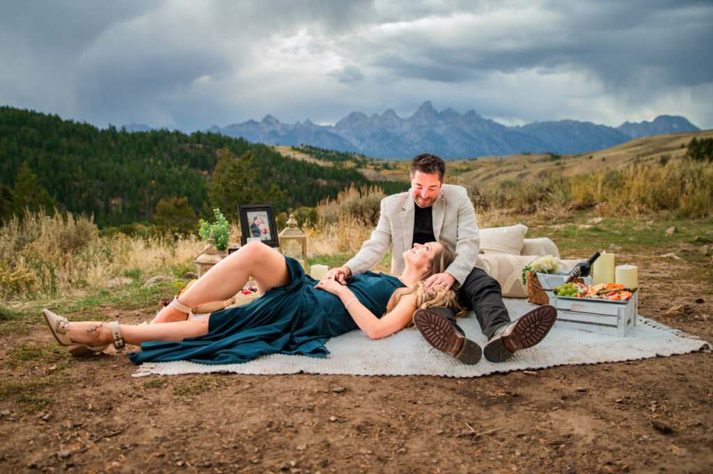 Jackson Hole elopement photographer captures couple laying on picnic blanket after last minute grand teton elopement