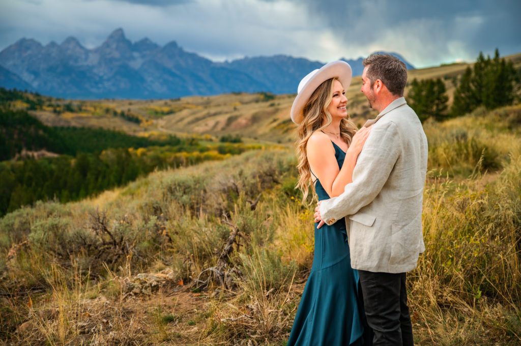 Jackson Hole elopement photographer captures bride and groom embracing in grand teton national park wedding 