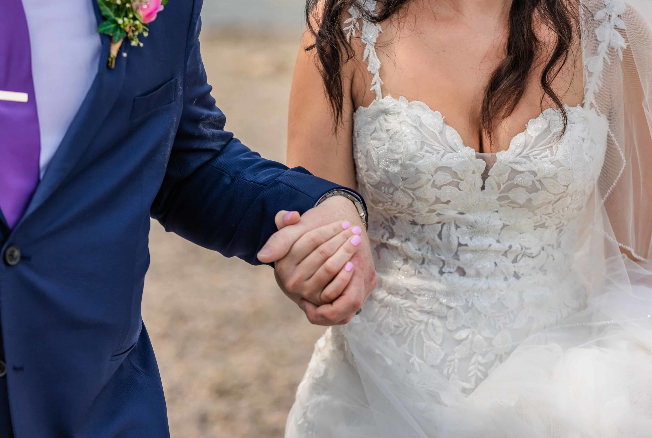 Jackson Hole wedding photographer captures close up of bride and groom's hands