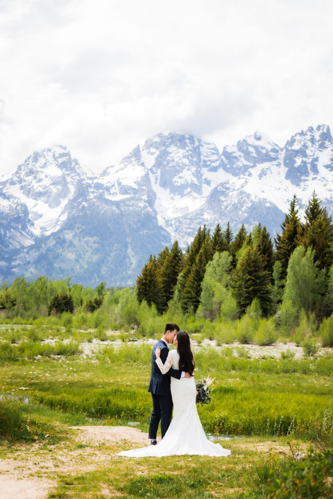 Jackson Hole elopement photographer captures couple embracing in Grand Teton National Park wedding