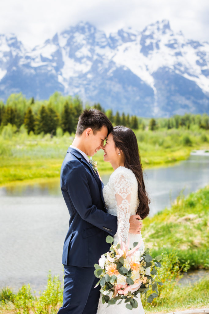 Jackson Hole elopement photographer captures couple embracing in Grand Teton wedding