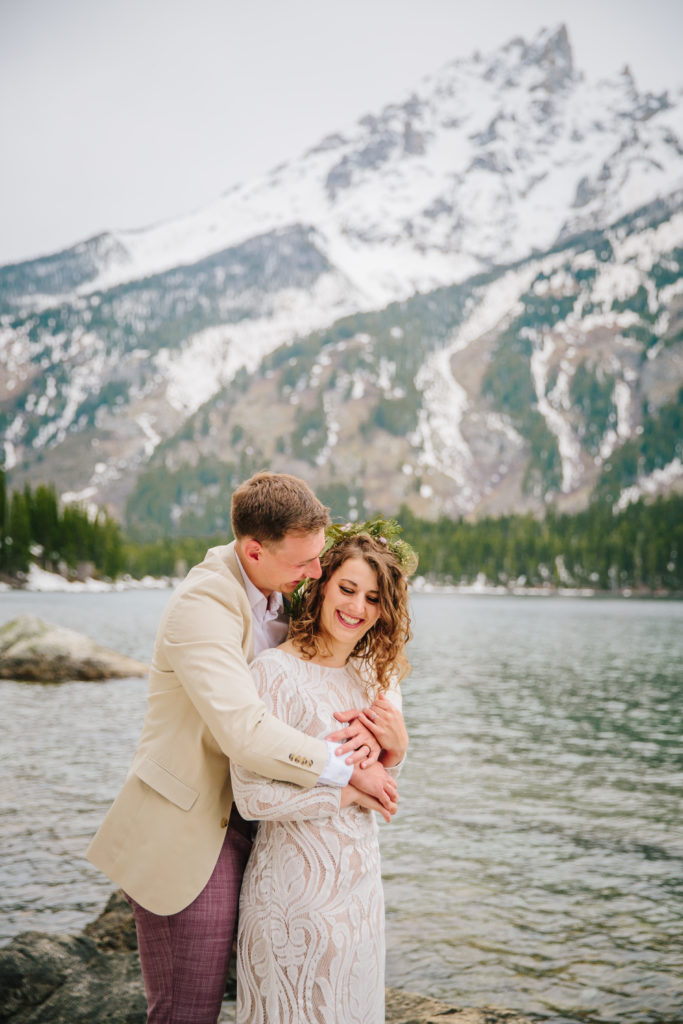 Jackson Hole wedding photographer captures couple embracing during elopement portraits