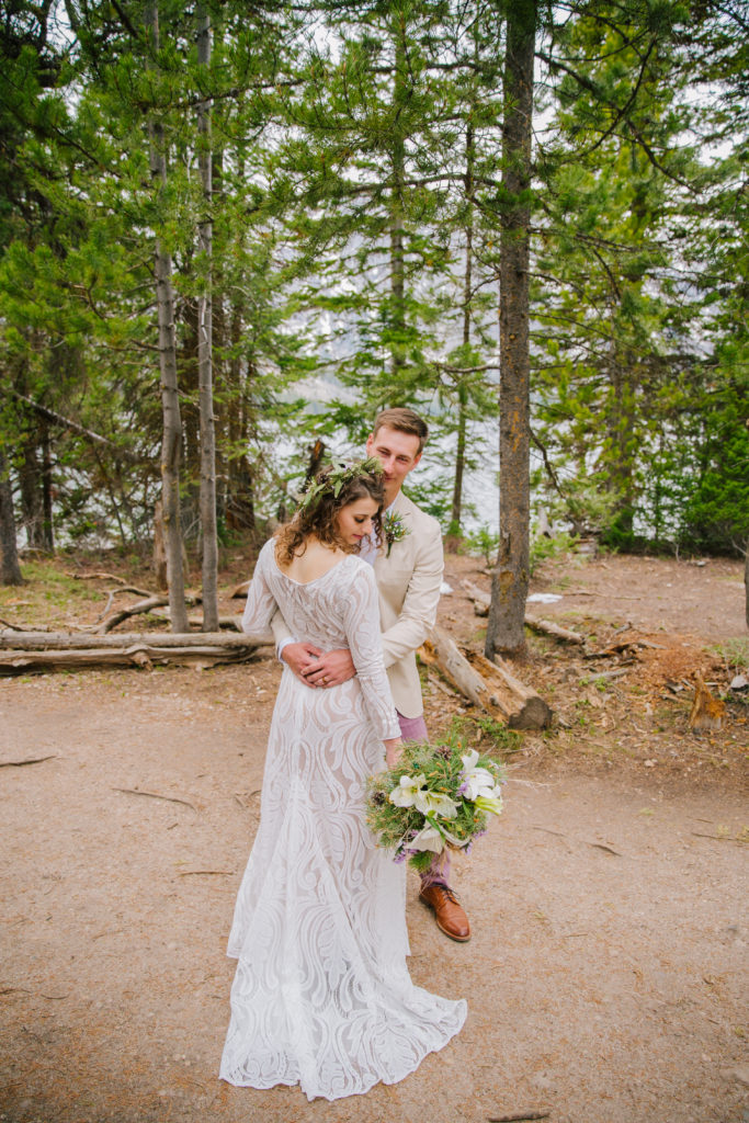 Jackson Hole wedding photographer captures couple in wedding attire in grand teton wedding photos