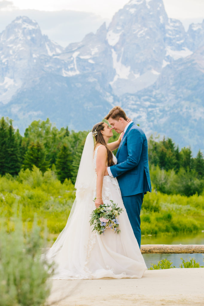 Jackson Hole wedding photographer captures couple kissing in Grand Teton National Park