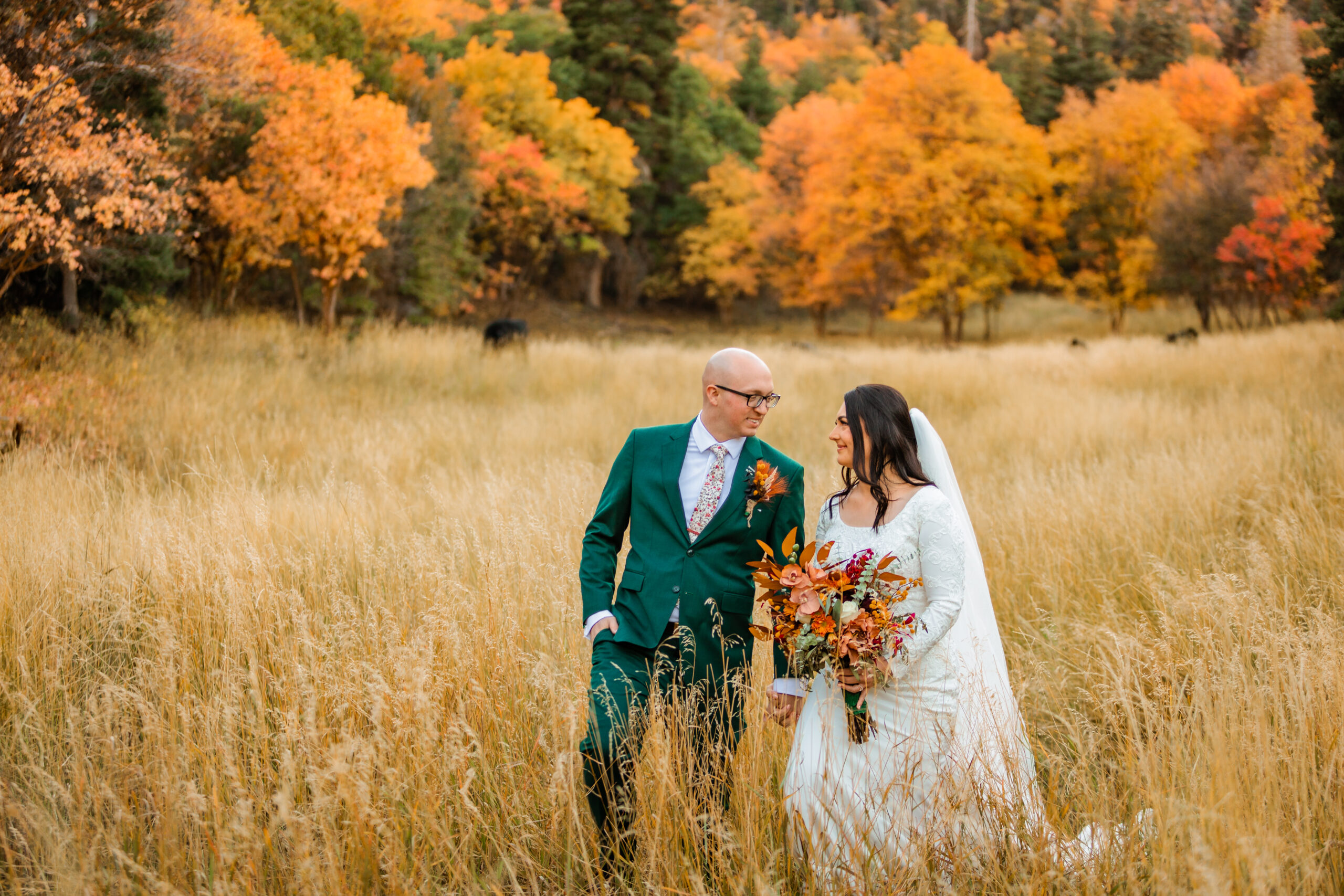 Jackson Hole elopement photographer captures couple laughing together after micro grand teton wedding