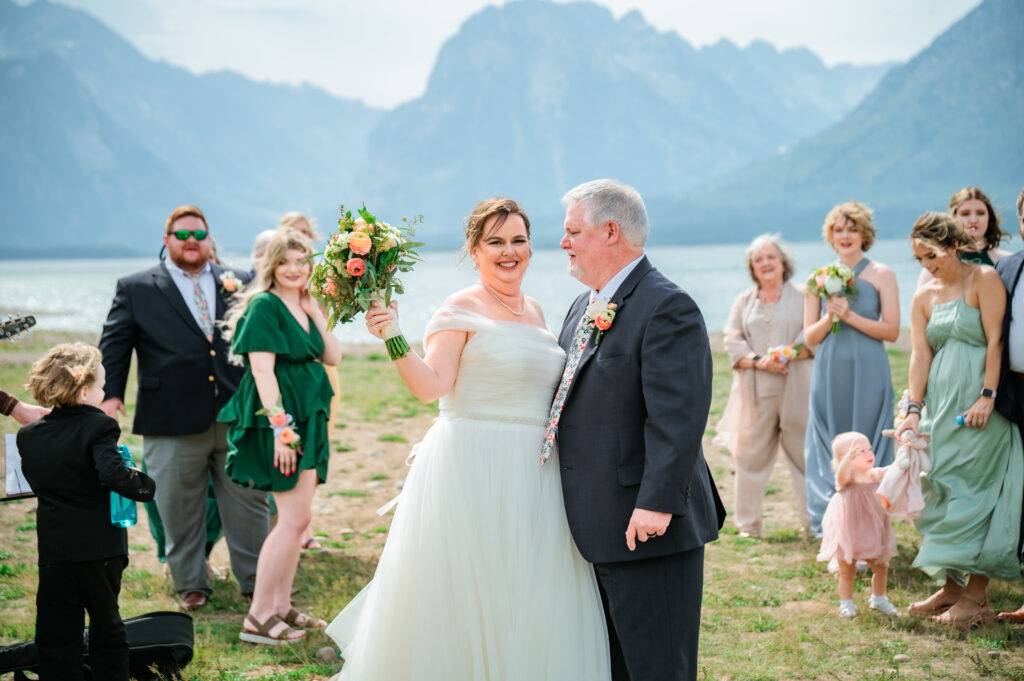 Jackson Hole wedding photographer captures couple celebrating recent marriage 