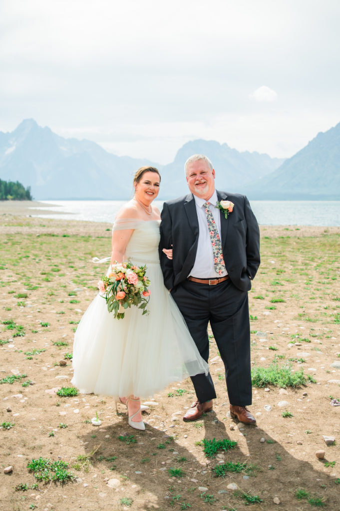 Jackson Hole elopement photographer captures bride and groom standing together after grand teton wedding