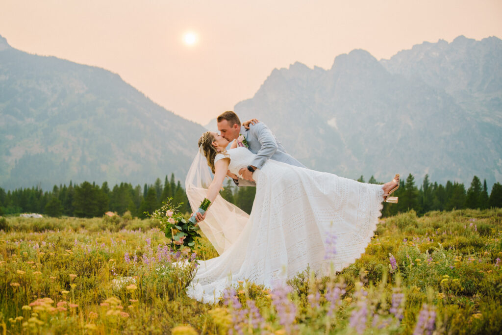 Jackson Hole photographer captures bride and groom kiss in Grand Teton wedding