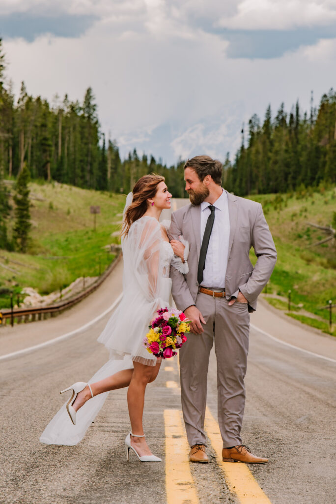 Jackson Hole photographers capture couple standing in street after elopement